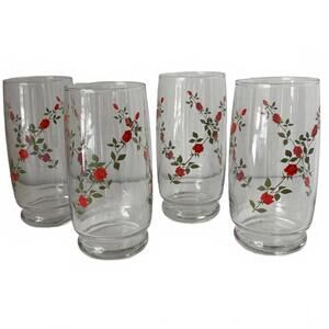 Set of 4 Anchor Hocking clear glass tumblers with red rose pattern.